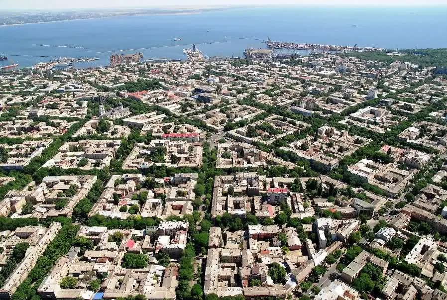 An aerial view of Odesa's port and city grid along the Black Sea coast