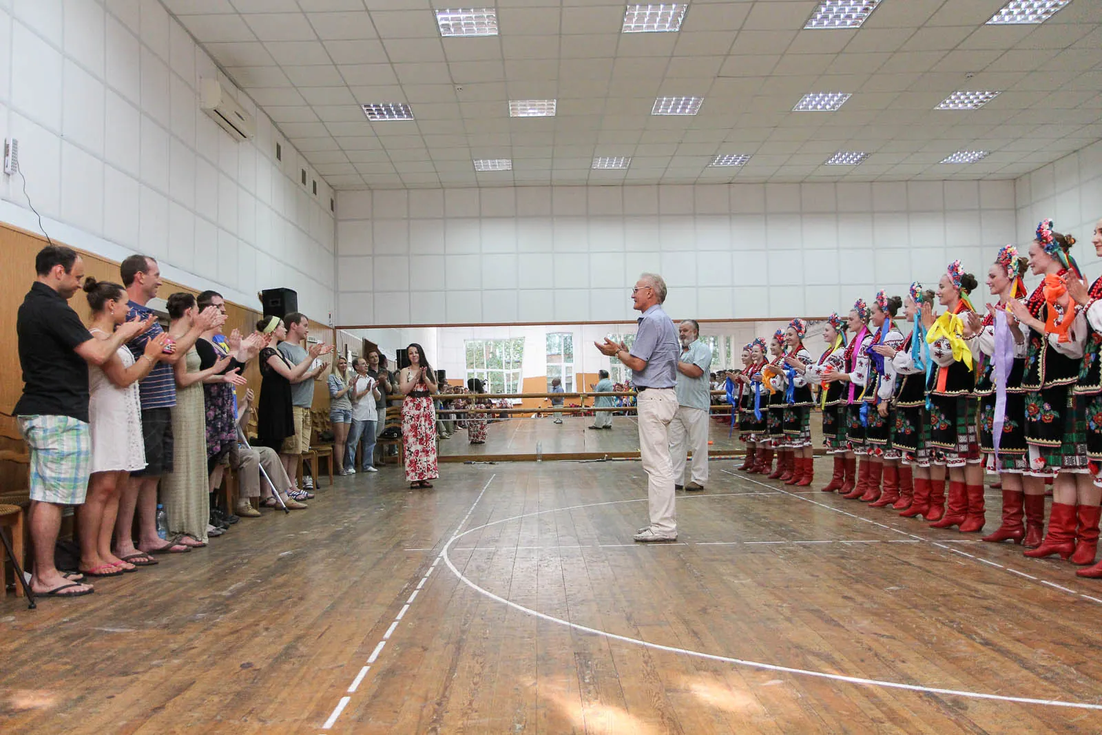 Prolisok dancers lined up greeting Ukrainian Dance Workshop Tour visitors in their studio